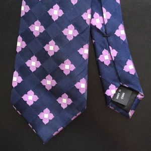 blue and purple flower pattern necktie